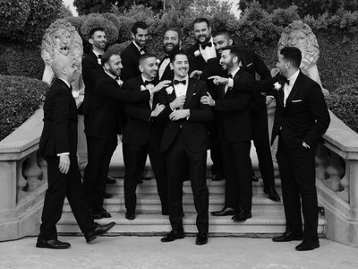Groomsmen Laughing with the Groom at Estate