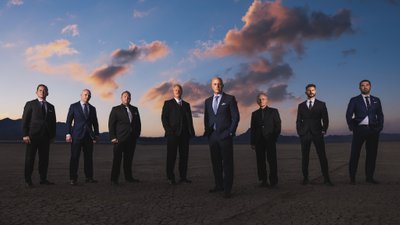 Groomsmen in Suits at Sunset
