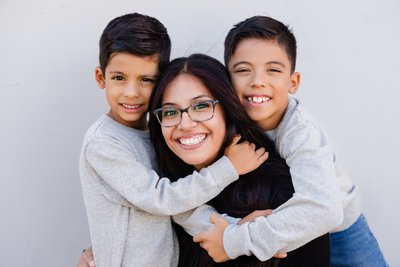 Playful Portrait of a Mother and Her Two Sons in Dallas