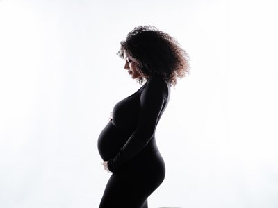 High-Key Silhouette Maternity Portrait