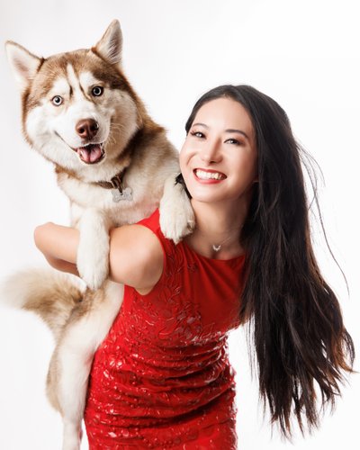 Joyful Husky and Owner Portrait in Red Dress