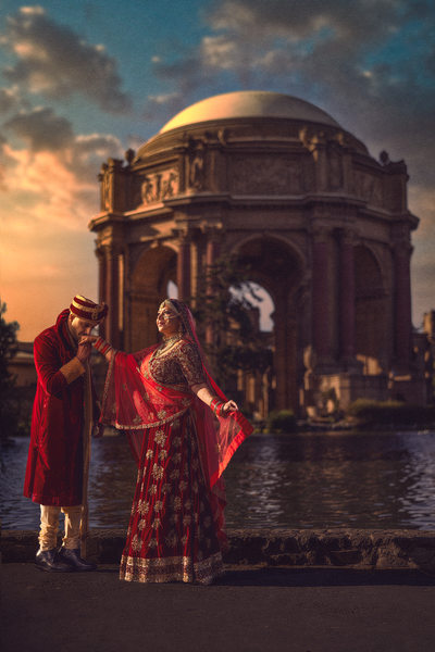 Indian Wedding Couple Posing for Wedding Photo at Sunset
