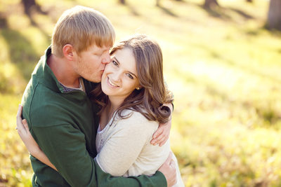Engagement Photograph in field by river in Columbia SC