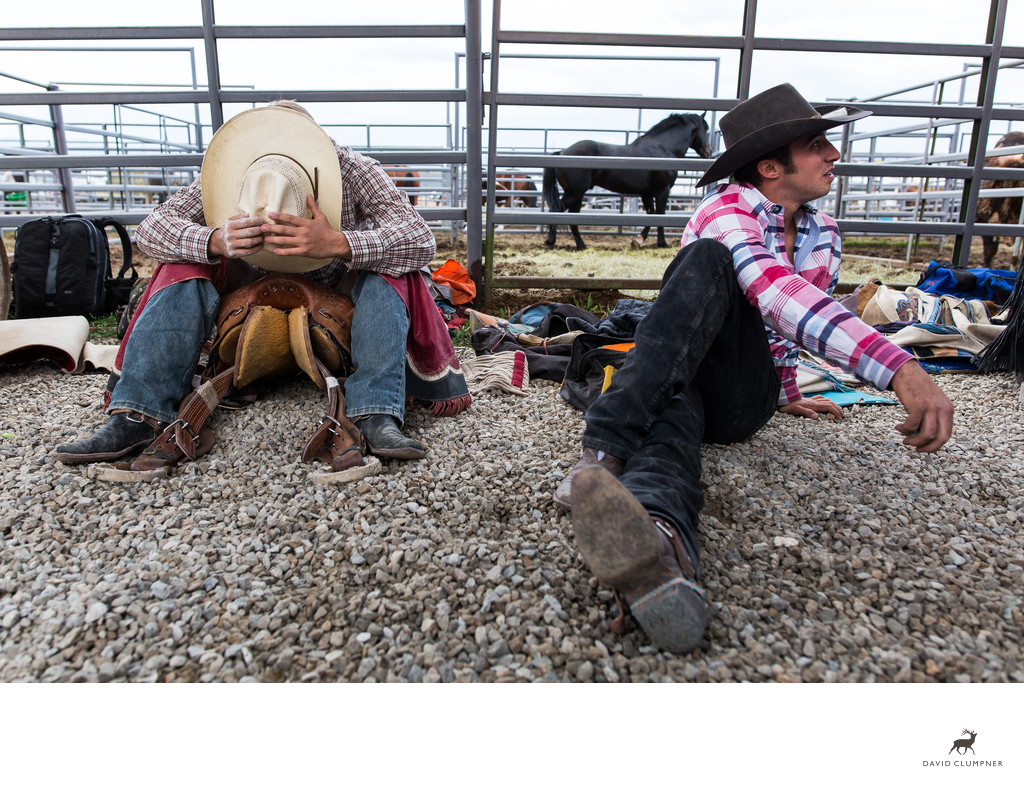 Cowboys Stretch and Pray Before Hamilton Montana Rodeo