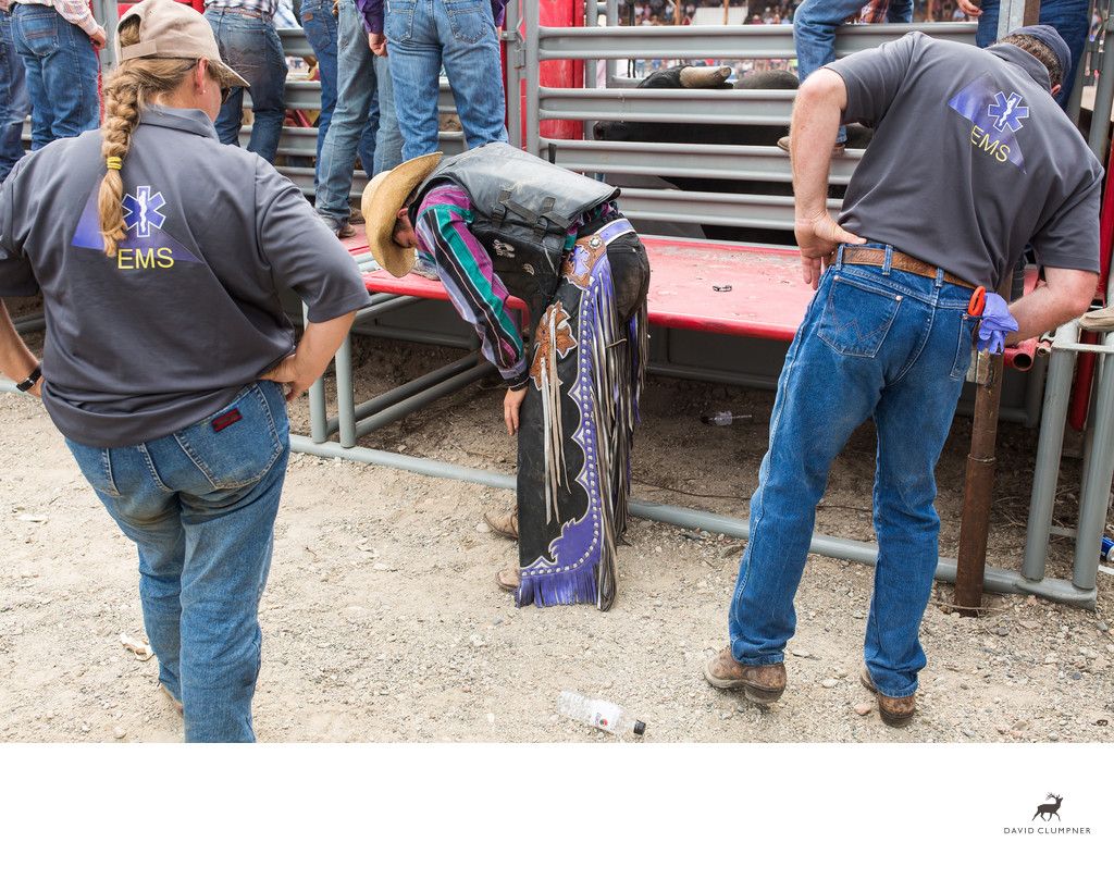 Injured Bronc Rider at Drummond, Montana Rodeo