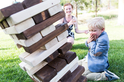 Boy Topples Jenga Game at 320 Guest Ranch in Montana