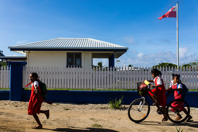 Girls Run Home from School in Kingdom of Tonga
