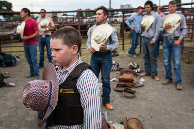 Young Cowboy Prepares for Three Forks Rodeo