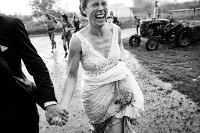 Bride Running in the Rain