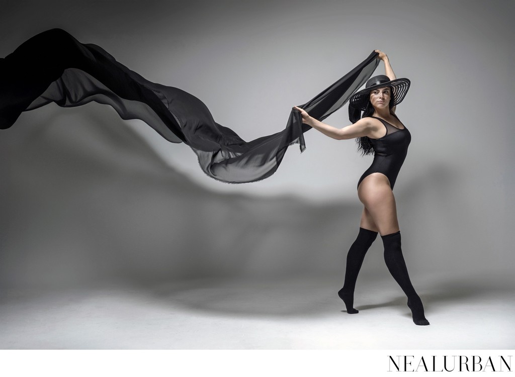 Studio Dancer with Hats and Material