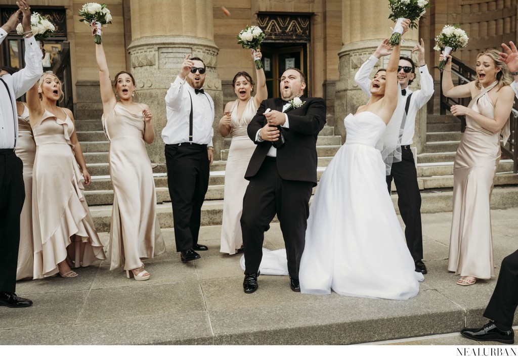 Groom Popping Champagne at Buffalo City Hall