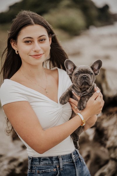 Senior Portrait at the Beach with her Pup