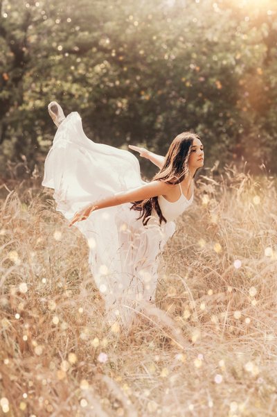 Ballerina in Tall wispy gold grass