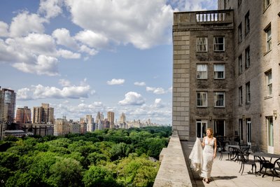 Bride walking on the New York Athletic Club Terrace 