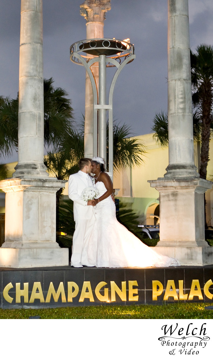 Bride and Groom Champagne Palace torch portrait Elmwood