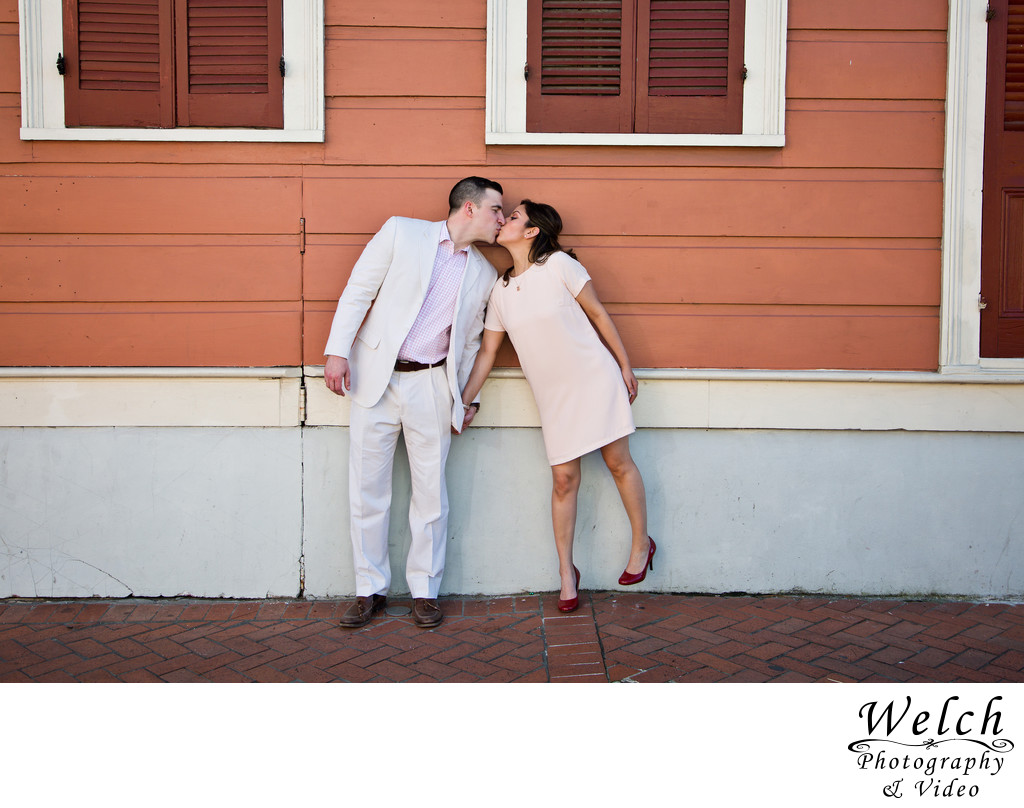 Engagement photo coral wall French Quarter New Orleans