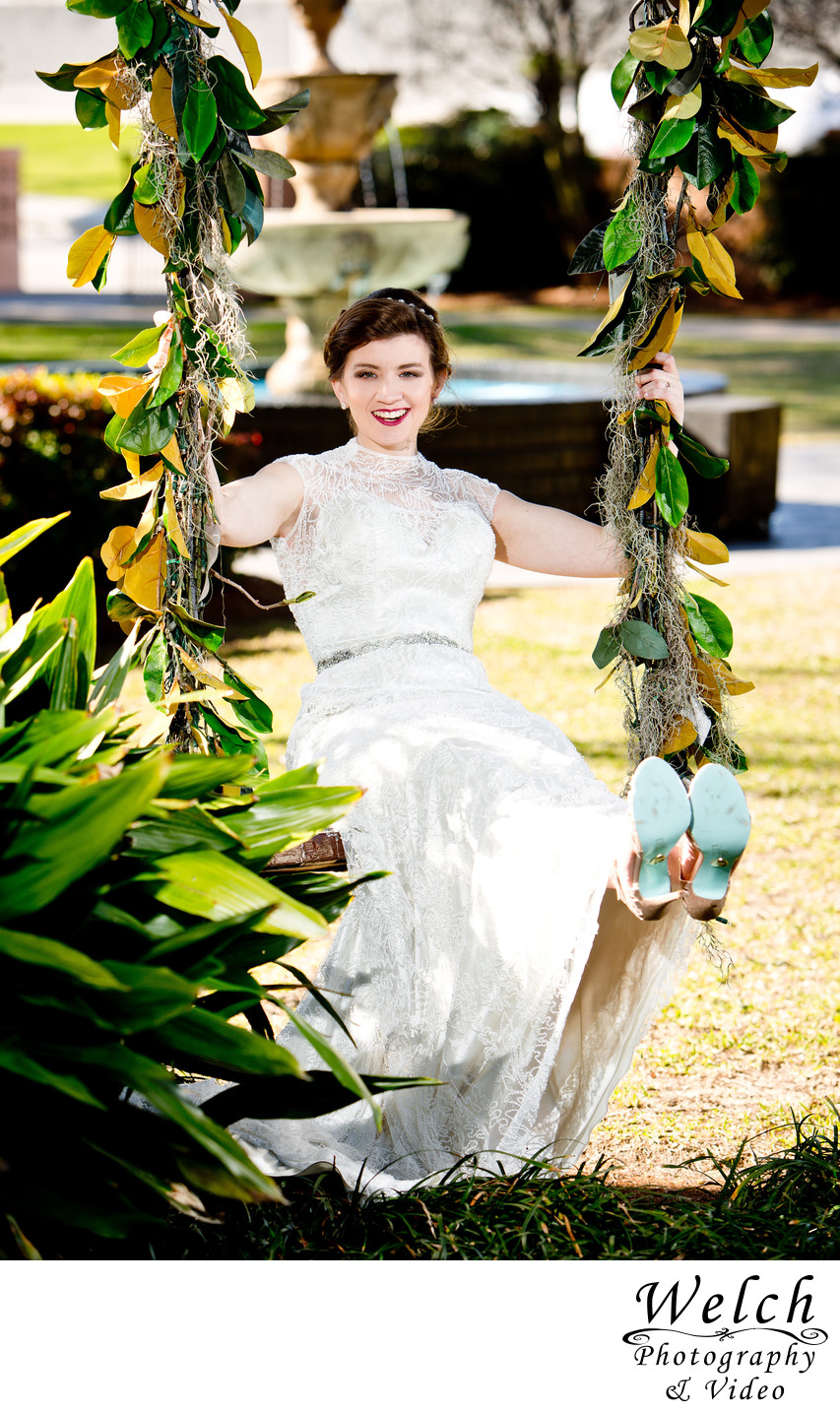 Bride on swing Southern Oaks Plantation New Orleans LA