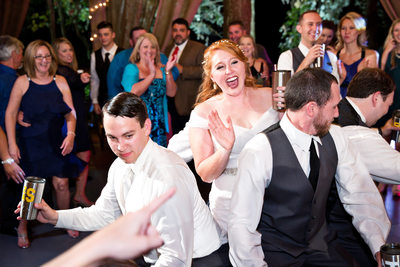 Bride laughing dancing reception Palmettos On The Bayou