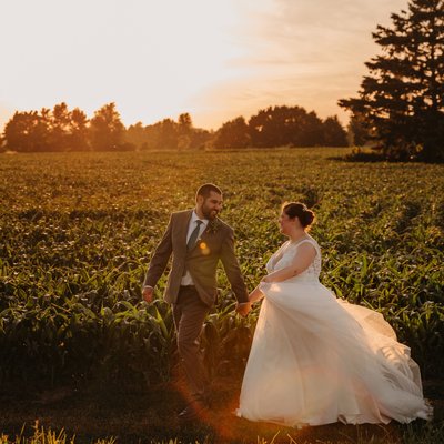 Stunning countryside sunset bride and groom portrait