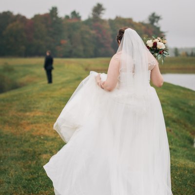 Gorgeous fall Bride and groom pond side first look
