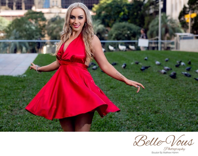 Spinning Model Wearing Red Dress on Grass