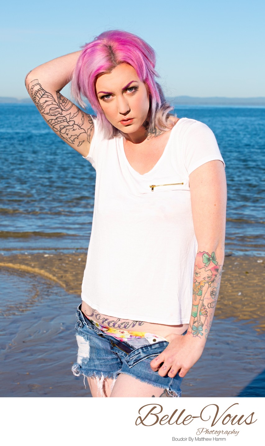 Model With Pink Hair Posing On The Beach