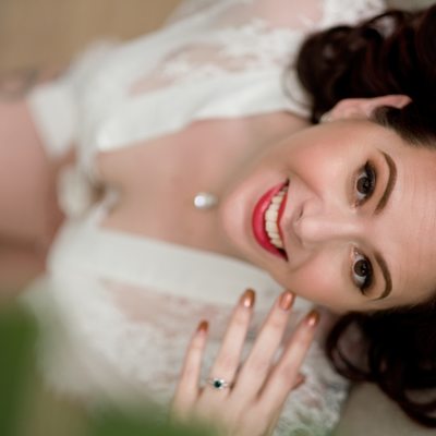 Bride posing for boudoir photograph