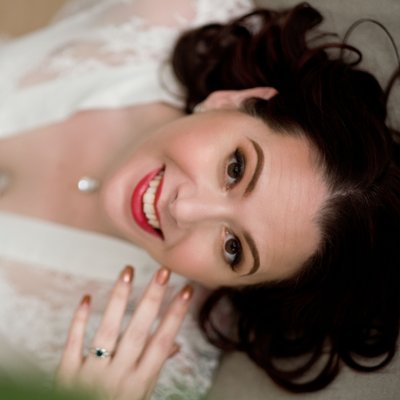 Bride posing for boudoir photograph