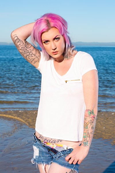 Model With Pink Hair Posing On The Beach