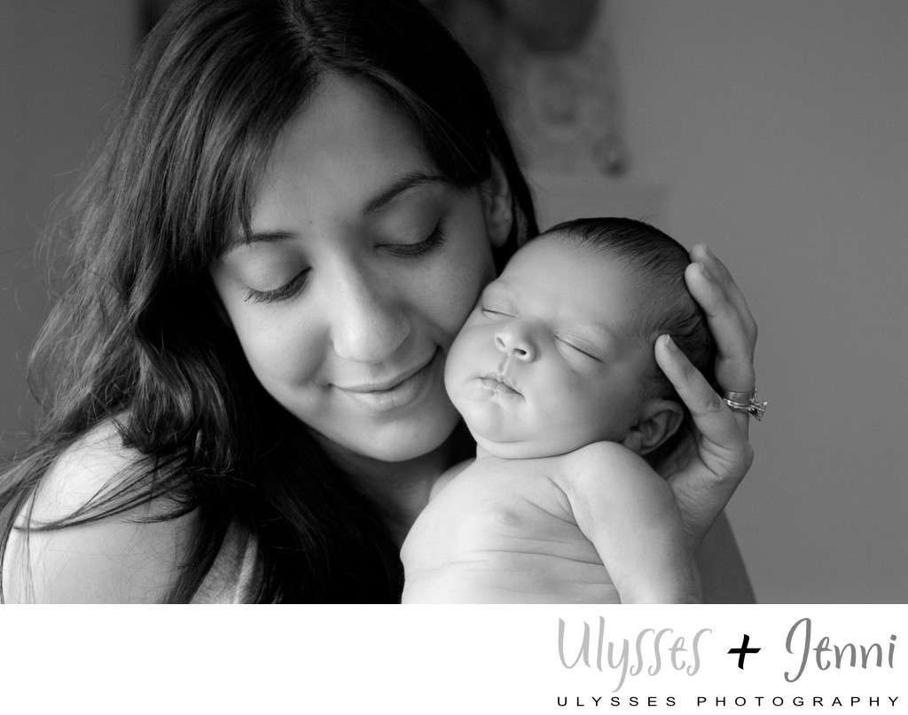 Joyous Mom and Newborn in Black and White