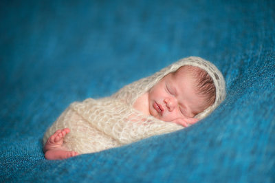 Snuggling Newborn Baby Boy Pic