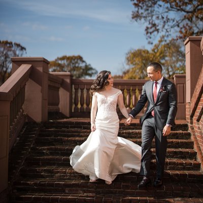 wedding photo on golf course stairs pine hollow cc