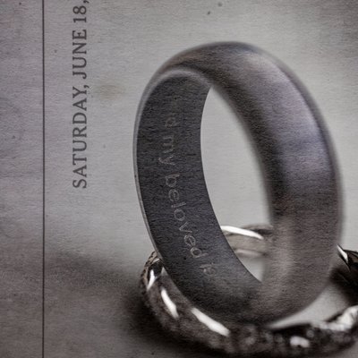 Wedding Rings with New York Times Newspaper