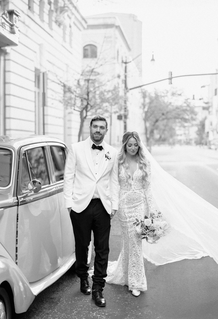 Newlyweds with Vintage Car
