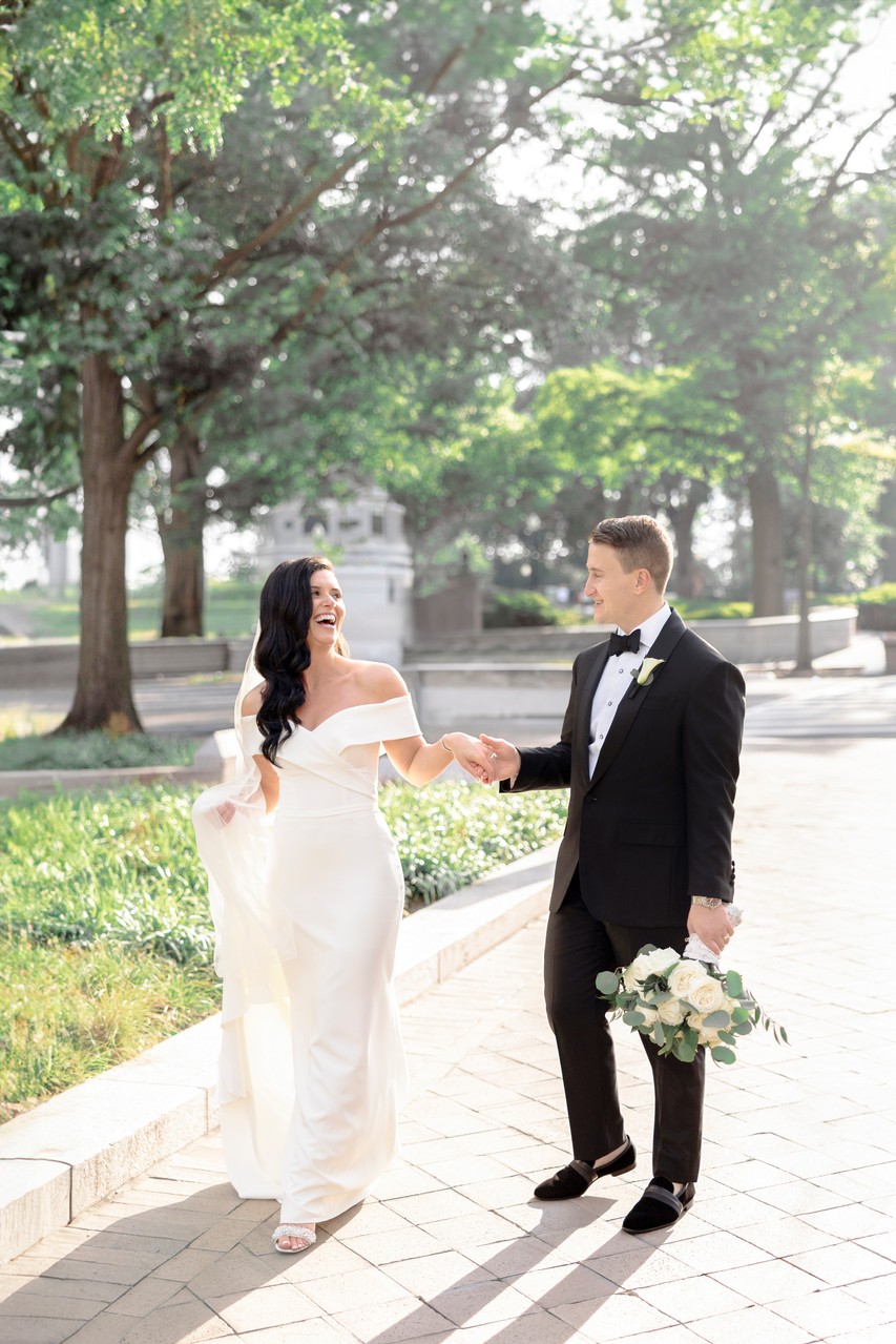 Newlywed Couple Walking and Laughing