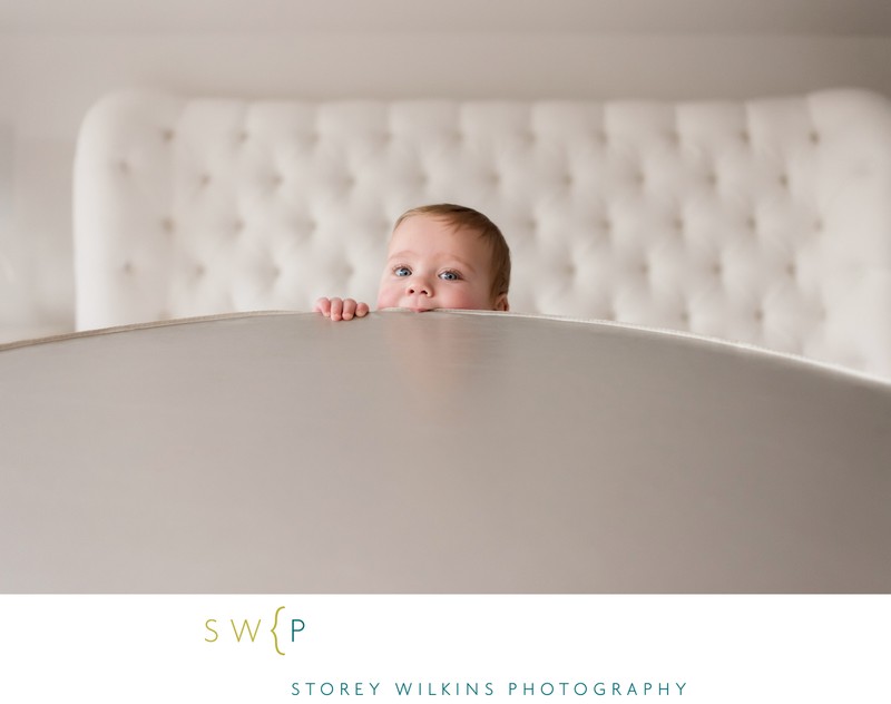 Baby Playing with My Reflector During a Photoshoot