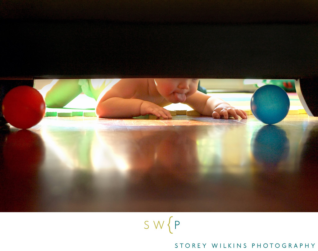 Baby and the Balls: Determination Captured Perfectly