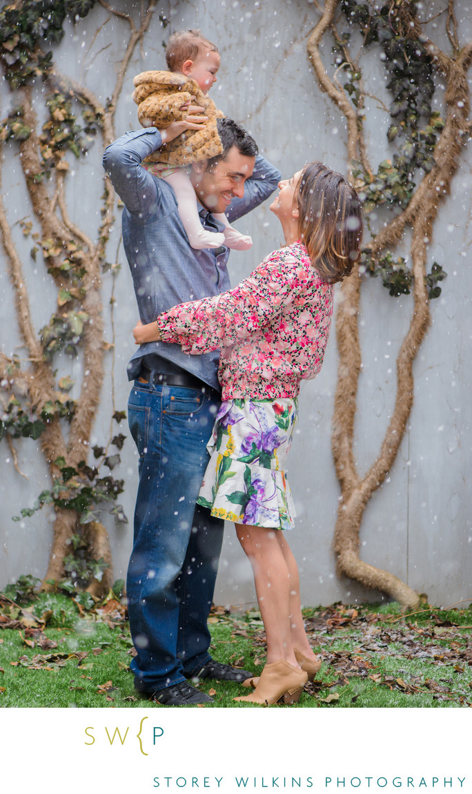 Spring Snowfall Family Photo in Backyard