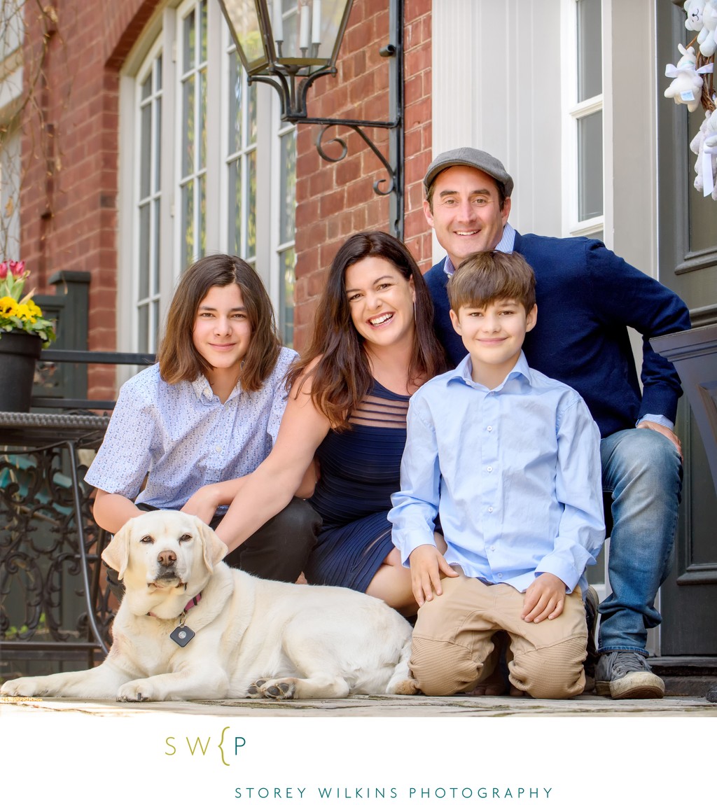 Family Portrait with White Lab at Home
