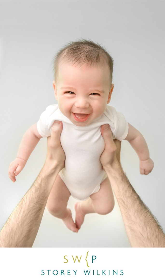 BABY IN DAD'S ARMS: AFTER IMAGE RETOUCHING