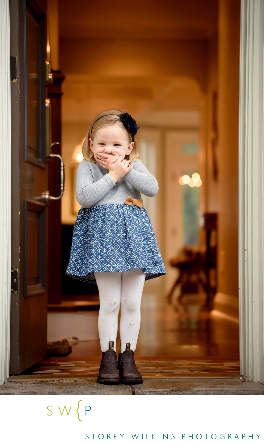 When Giggles Take Over: A Child's Joyful Portrait