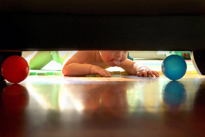 Baby and the Balls: Determination Captured Perfectly