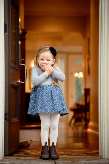 When Giggles Take Over: A Child's Joyful Portrait