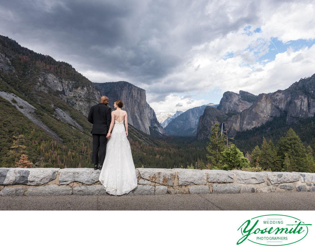 Bride And Groom Look Out Over Yosemite Valley