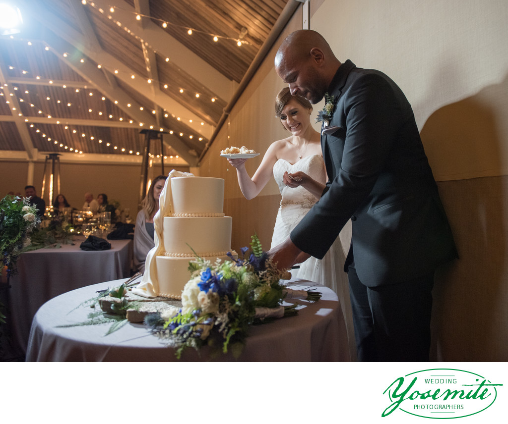 Bride And Groom Cut The Cake At Tenaya Lodge Wedding