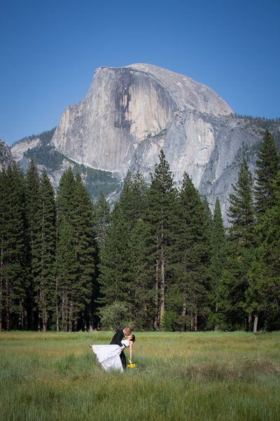 A Classic Dip Pose of a Wedding Couple in Cook's Meadow
