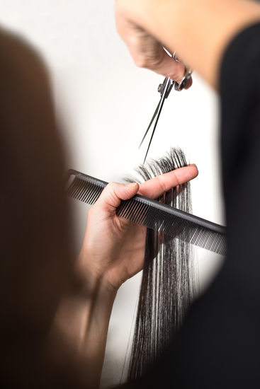 Business branding photographer captures salon haircut