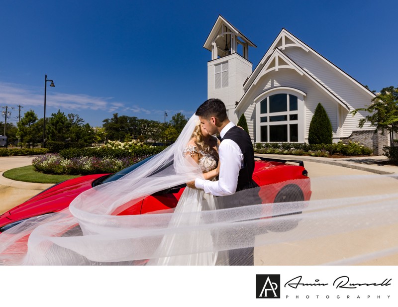 Swoosh veil in front of red corvette