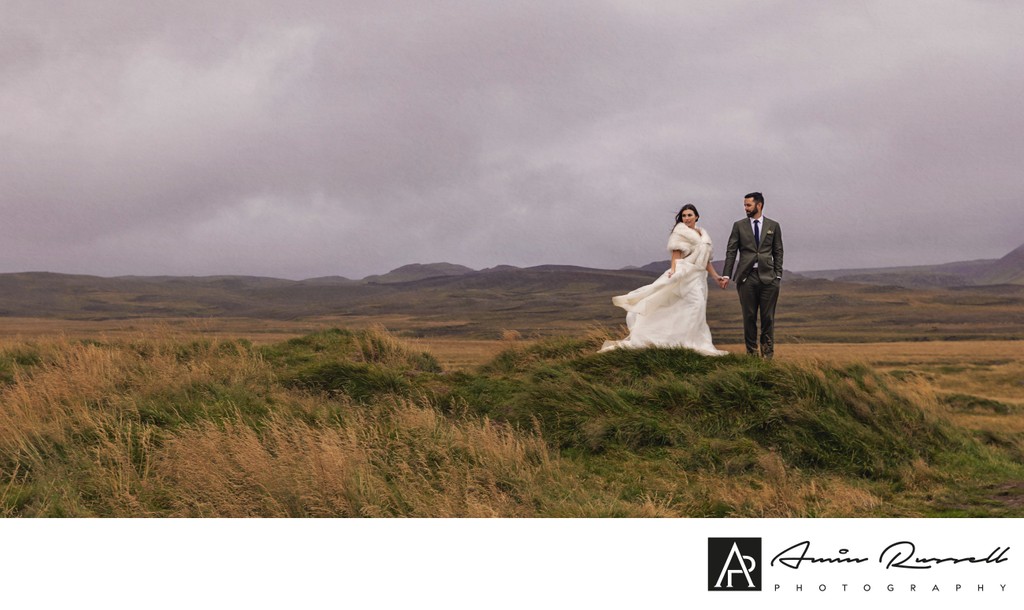 Wedding couple on the hills of Iceland