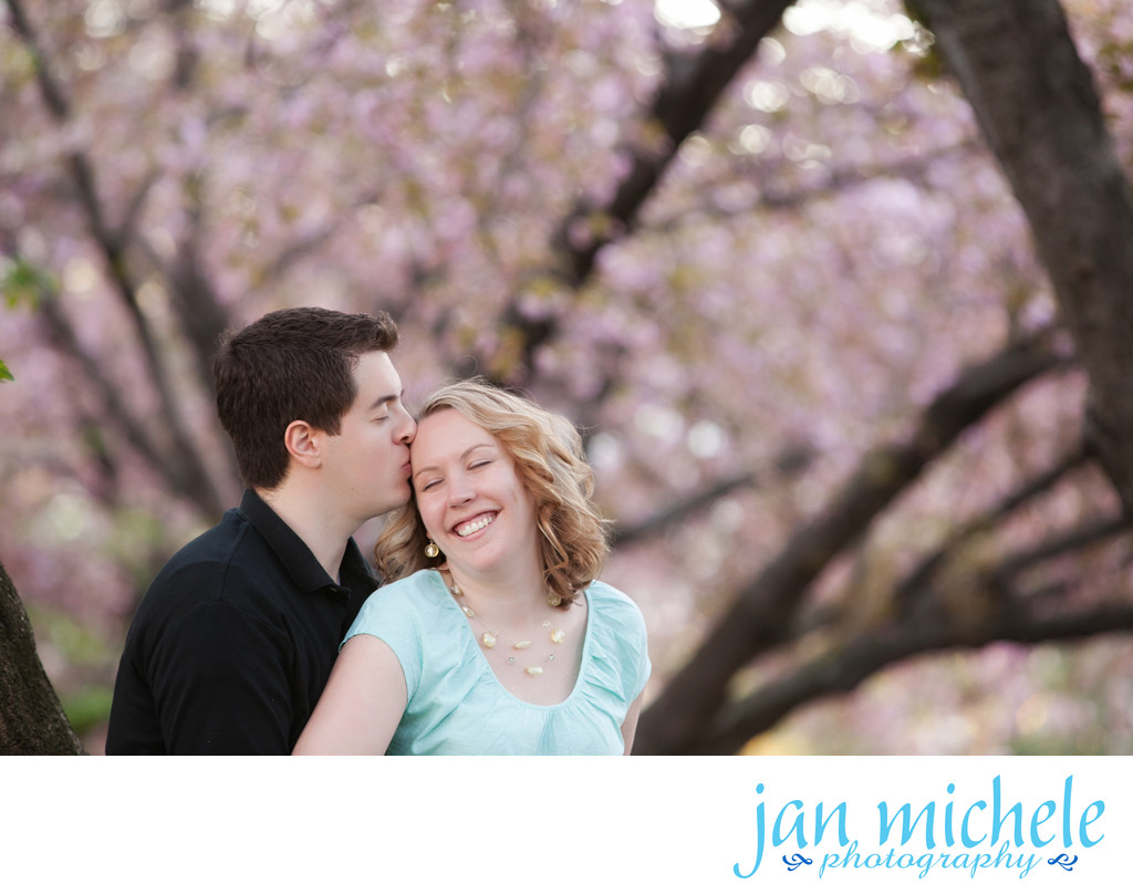 Engagement photo under the cherry blossoms